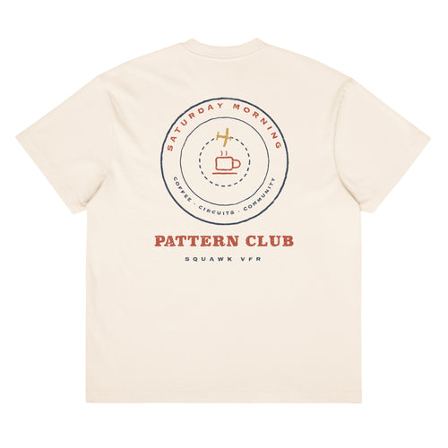 Saturday Morning Pattern Club Tee back print — circular badge of an airplane orbiting a coffee cup on vintage white tee, SquawkVFR