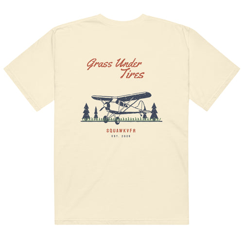 Grass Under Tires aviation tee — back print of a taildragger parked on a grass strip, ivory garment-dyed cotton