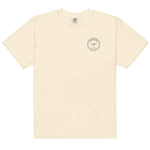 SquawkVFR Crest Tee — small circular aviation crest with a high-wing single at centre chest, ivory garment-dyed cotton
