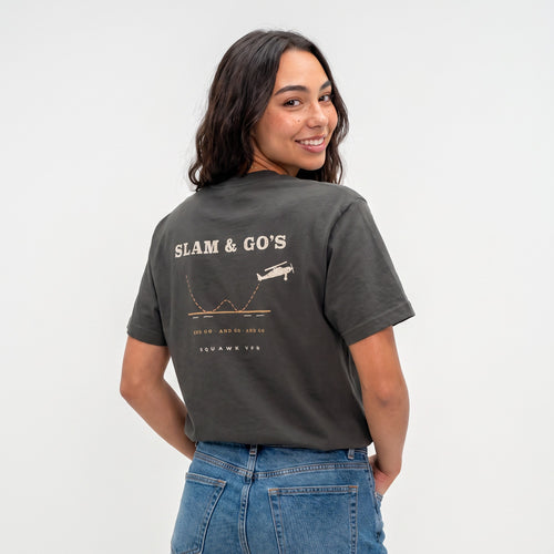 On-model — Slam & Go Tee back print with touch-and-go flight path, worn on charcoal tee, SquawkVFR