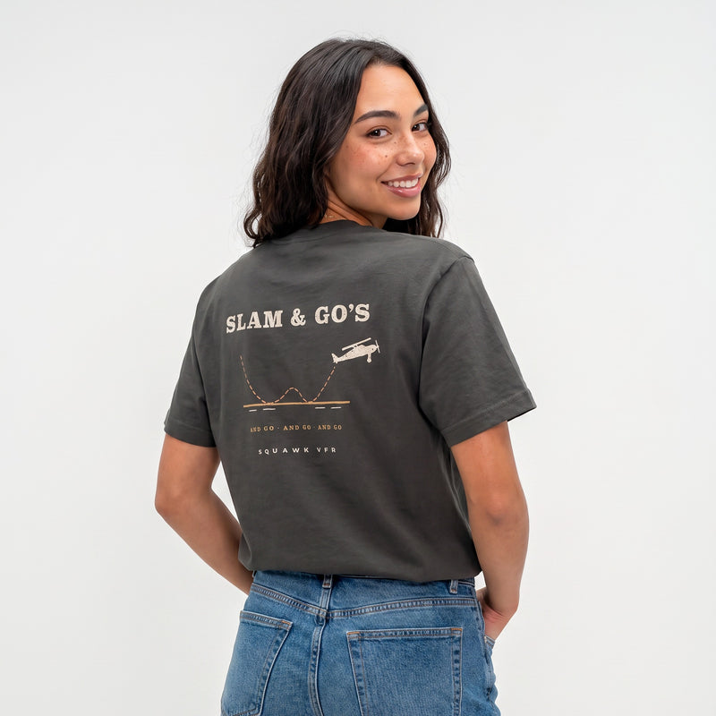 On-model — Slam & Go Tee back print with touch-and-go flight path, worn on charcoal tee, SquawkVFR