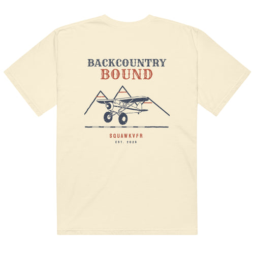 Backcountry Bound aviation tee — back print of a bush plane on a short strip between mountain peaks, ivory garment-dyed cotton
